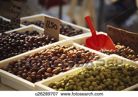 Stock Photo - Variety of different olives on sale in Turkish market.. Fotosearch