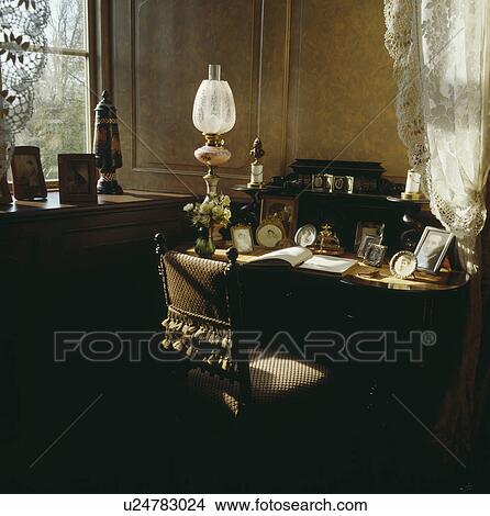 Victorian glass lamp on mahogany deaks View Large Photo Image Picture - Victorian glass lamp on mahogany deaks. Fotosearch