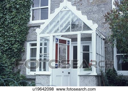Stock Photo - Victorian glass porch with stained glass in half glazed door. Fotosearch