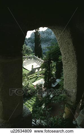 View through arch of terraced Provencal garden View Large Photo Image Stock Photo - View through arch of terraced Provencal garden. Fotosearch