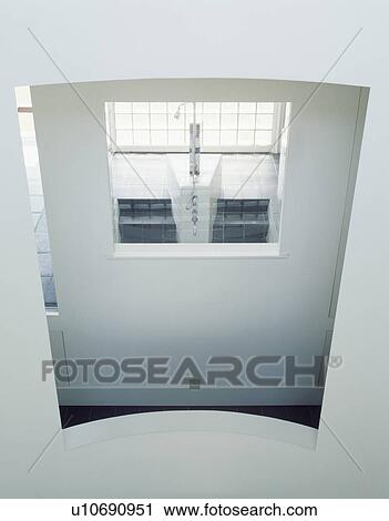 View through interior window in white wall of modern bathroom View Large Photo Image Stock Image - View through interior window in white wall of modern bathroom. Fotosearch