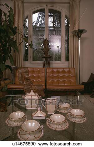 White and red Art Deco teaset on glass table in thirties dining room View Large Photo Image Stock Image - White and red Art Deco teaset on glass table in thirties dining room. Fotosearch