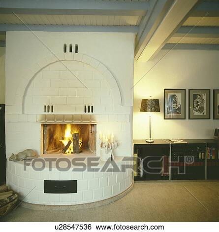 White brick fireplace in traditional Scandinavian living room View Large Photo Image Stock Photograph - White brick fireplace in traditional Scandinavian living room. Fotosearch
