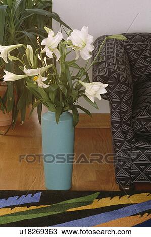 Stock Image - White lilies in vase. Fotosearch