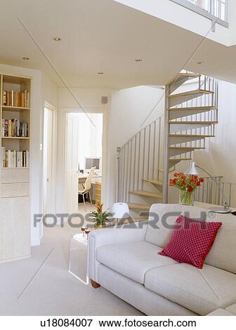 White sofa and spiral staircase in modern white living room View Large Photo Image Stock Photo - White sofa and spiral staircase in modern white living room. Fotosearch