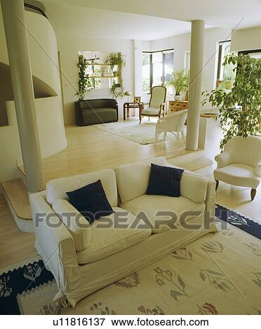 White sofa in modern openplan living room View Large Photo Image Stock Photo - White sofa in modern openplan living room. Fotosearch