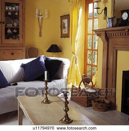 White sofa in yellow living room with yellow curtains View Large Photo Image Stock Image - White sofa in yellow living room with yellow curtains. Fotosearch