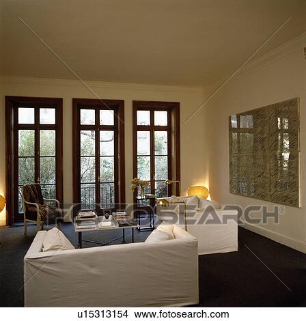 White sofas in modern white living room View Large Photo Image Picture - White sofas in modern white living room. Fotosearch