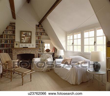 White throw on sofa in white living room View Large Photo Image Stock Photograph - White throw on sofa in white living room. Fotosearch