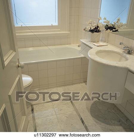 White tiled architectural bathroom. View Large Photo Image Stock Photo - White tiled architectural bathroom.. Fotosearch