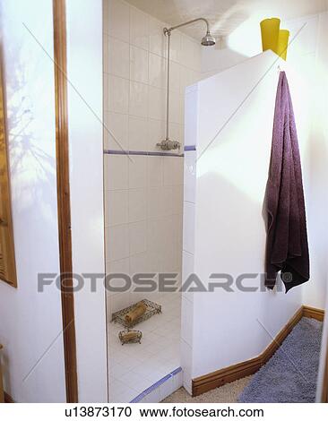 White tiled shower room with chrome showerhead View Large Photo Image Stock Image - White tiled shower room with chrome showerhead. Fotosearch