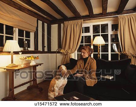 woman, room, wreath, dog, occasions, christmas View Large Photo Image Stock Image - woman, room, wreath, dog, occasions, christmas. Fotosearch