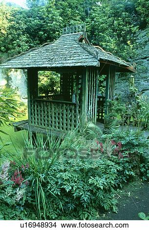 Picture - Wooden gazebo in country garden. Fotosearch