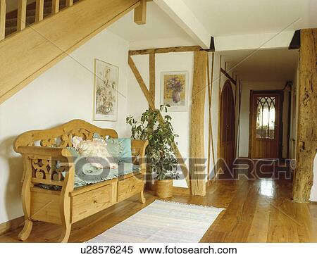 Wooden pine settle in cottage hall View Large Photo Image Stock Photography - Wooden pine settle in cottage hall. Fotosearch