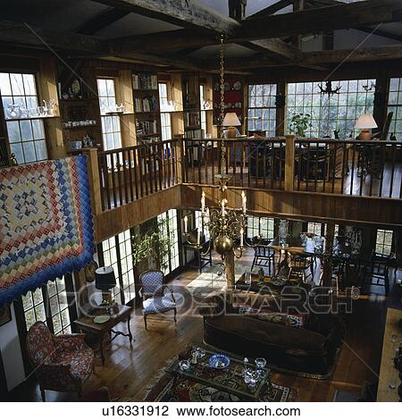 Aerial view of traditional barn conversion living room with upper gallery View Large Photo Image Stock Image - Aerial view of traditional barn conversion living room with upper gallery. Fotosearch