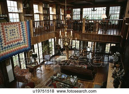 Aerial view of traditional barn conversion living room with upper gallery View Large Photo Image Stock Photo - Aerial view of traditional barn conversion living room with upper gallery. Fotosearch