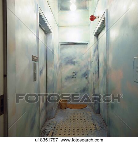 Stock Photo - Apartment hall with trompe l'oiel paint effect clouds on walls and door. Fotosearch