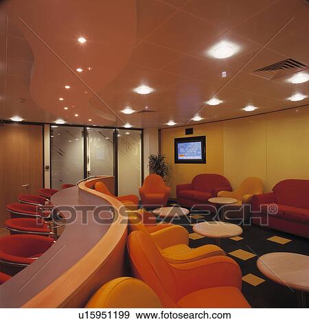 Stock Photo - Bar area and television room lounge.. Fotosearch
