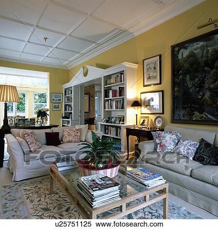 Beige sofas in yellow living room View Large Photo Image Stock Photography - Beige sofas in yellow living room. Fotosearch