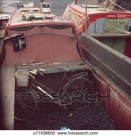 Bicycle and coal in hold of traditional narrow boat View Large Photo Image Stock Image - Bicycle and coal in hold of traditional narrow boat. Fotosearch