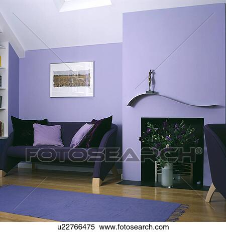 Black sofa with mauve cushions in mauve living room View Large Photo Image Stock Photography - Black sofa with mauve cushions in mauve living room. Fotosearch