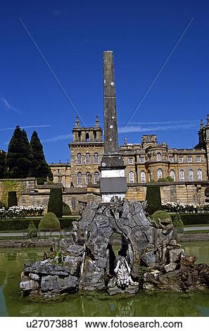 Stock Image - Blenheim Palace, Woodstock, near Oxford, Oxfordshire, England. View from lower water terrace. Large fountain in foreground.. Fotosearch
