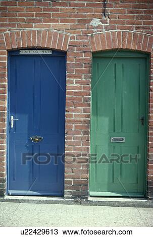 Blue and green front doors in terraced brick cottages View Large Photo Image Stock Image - Blue and green front doors in terraced brick cottages. Fotosearch