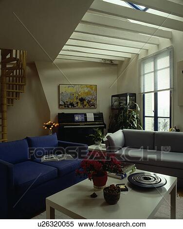 Blue and grey sofas in modern apartment living room View Large Photo Image Stock Photography - Blue and grey sofas in modern apartment living room. Fotosearch