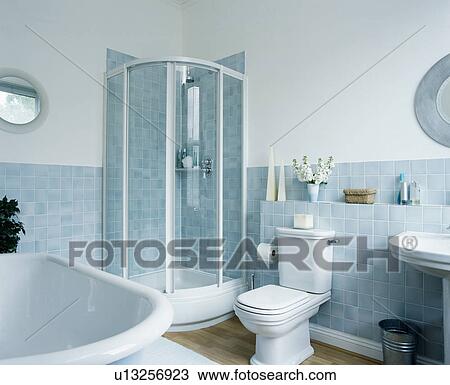 Blue and white bathroom with corner shower cubicle View Large Photo Image Stock Image - Blue and white bathroom with corner shower cubicle. Fotosearch