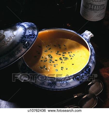 Stock Photograph - Blue and white tureen of pumpkin soup. Fotosearch