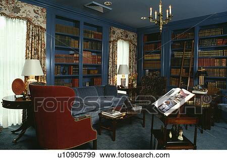 Stock Photo - Bookshelves in traditional living room. Fotosearch