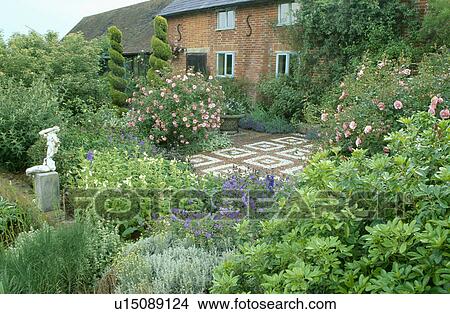 Brick and stone paving in garden of country cottage in summer View Large Photo Image Picture - Brick and stone paving in garden of country cottage in summer. Fotosearch