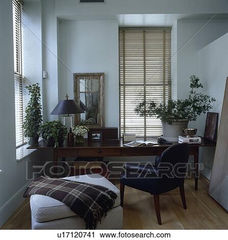 Calm home office with oak table and leather chair. View Large Photo Image Stock Image - Calm home office with oak table and leather chair.. Fotosearch