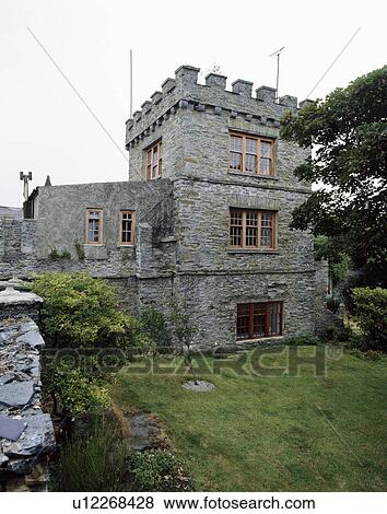 Castellated stone house with traditional replacement windows View Large Photo Image Stock Photo - Castellated stone house with traditional replacement windows. Fotosearch