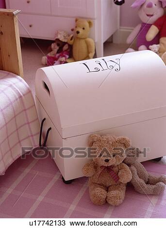 Stock Image - Child's pink bedroom with Lily box. Fotosearch