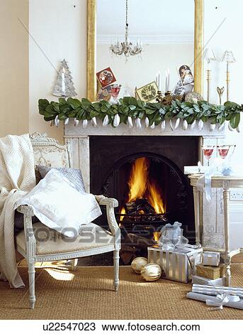 Christmas Decorations On Marble Fireplace Stock Image U22547023