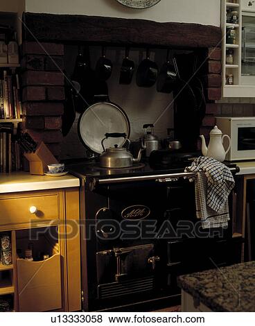 Close-up of an Aga in a Kitchen. View Large Photo Image Stock Photo - Close-up of an Aga in a Kitchen.. Fotosearch