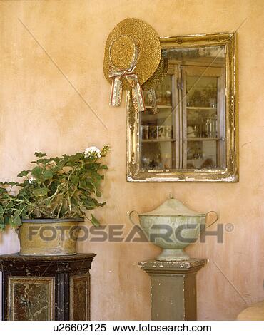Close-up of antique mirror above urn on plinth View Large Photo Image Stock Photography - Close-up of antique mirror above urn on plinth. Fotosearch