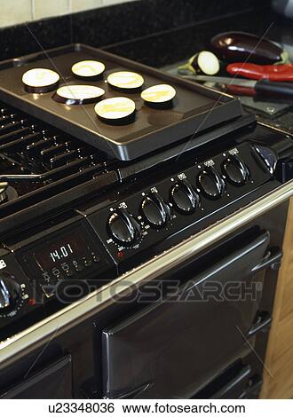 Close-up of black range oven View Large Photo Image Stock Photograph - Close-up of black range oven. Fotosearch