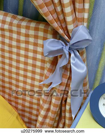 Close-up of blue bow on red+white checked curtain View Large Photo Image Stock Photo - Close-up of blue bow on red+white checked curtain. Fotosearch