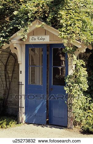 Close-up of blue double doosr on traditional house View Large Photo Image Stock Image - Close-up of blue double doosr on traditional house. Fotosearch