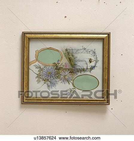 Picture - Close-up of blue floral picture in gilt frame. Fotosearch
