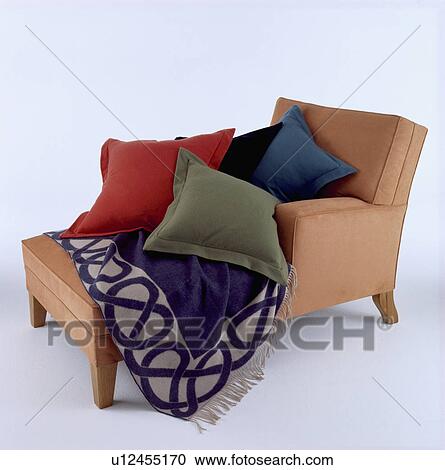 Close-up of chaiselongue with assorted cushions and patterned throw View Large Photo Image Stock Image - Close-up of chaiselongue with assorted cushions and patterned throw. Fotosearch