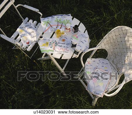 Close-up of children's drawings on chairs and table View Large Photo Image Stock Image - Close-up of children's drawings on chairs and table. Fotosearch