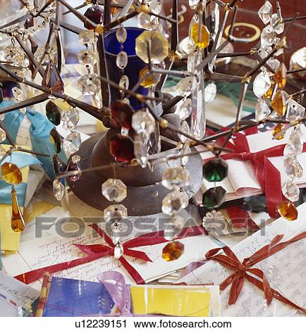 Close up of Christmas table decoration of glass droplets on metal tree View Large Photo Image Stock Image - Close up of Christmas table decoration of glass droplets on metal tree. Fotosearch