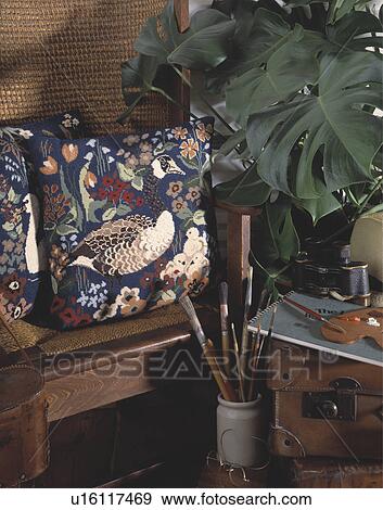 Close-up of floral cross-stitch cushion View Large Photo Image Stock Photo - Close-up of floral cross-stitch cushion. Fotosearch