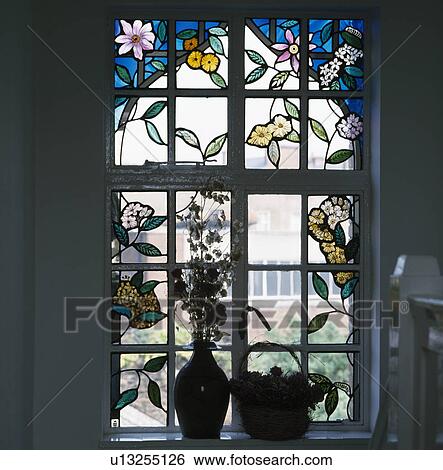Close-up of floral stained glass window View Large Photo Image Stock Photograph - Close-up of floral stained glass window. Fotosearch