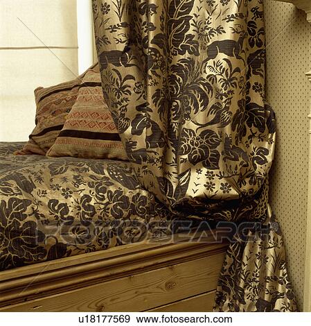 Close-up of gold patterned curtain View Large Photo Image Stock Photo - Close-up of gold patterned curtain. Fotosearch