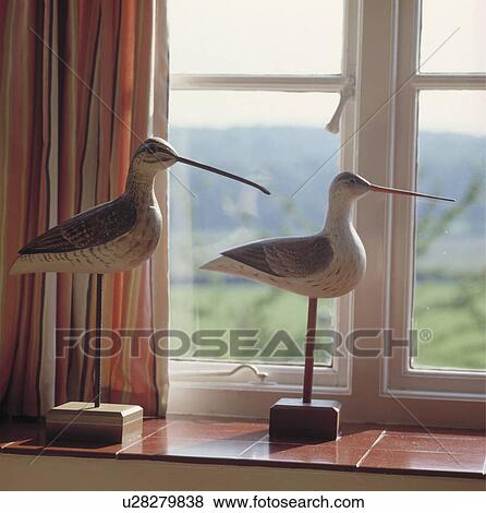 Close-up of hand-carved wooden birds View Large Photo Image Stock Photo - Close-up of hand-carved wooden birds. Fotosearch