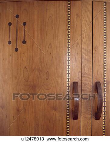 Close-up of inlaid walnut wood doors View Large Photo Image Stock Image - Close-up of inlaid walnut wood doors. Fotosearch